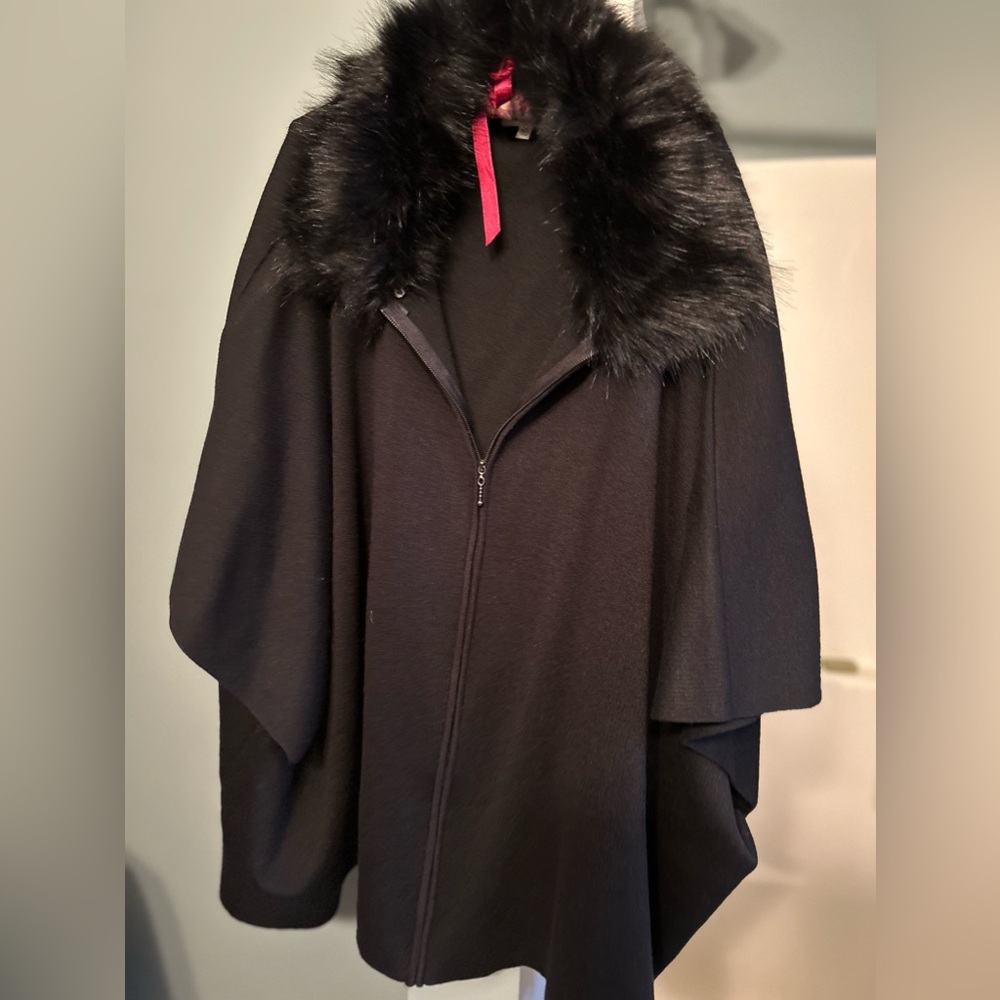 Black poncho.